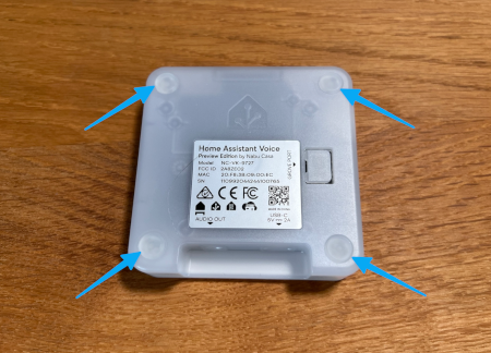 Image showing the back of the device, pointing out the location of the rubber pads